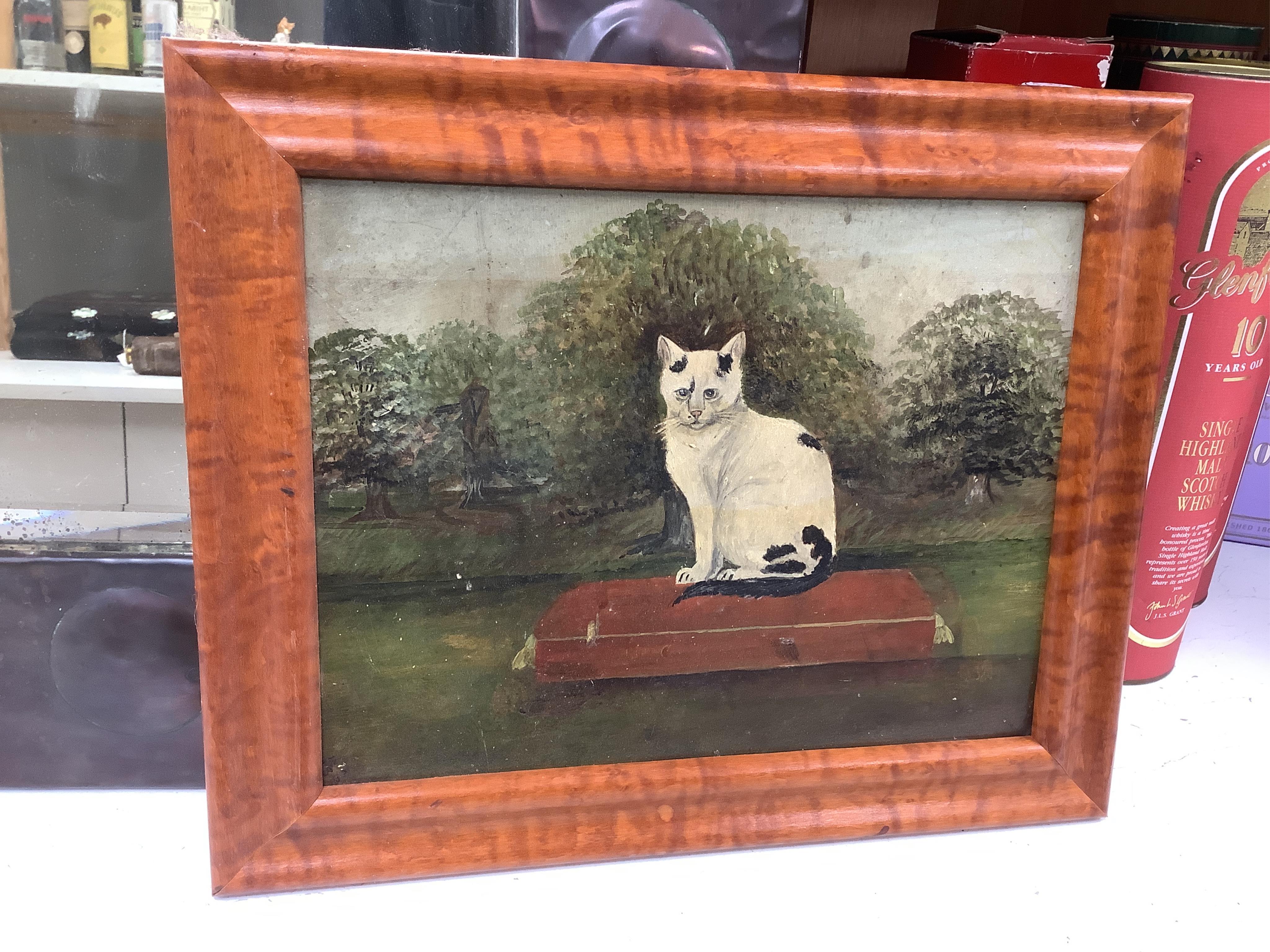 Late 19th / early 20th century, naive English School, oil on board, Study of a seated cat, indistinctly monogrammed lower left, 22 x 29cm. Condition - fair